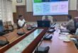 Sonitpur District Commissioner Shri Ananda Kumar Das and TERI officials discussing biodiversity conservation in a meeting room.