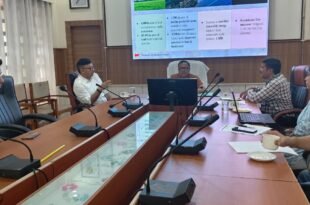 Sonitpur District Commissioner Shri Ananda Kumar Das and TERI officials discussing biodiversity conservation in a meeting room.